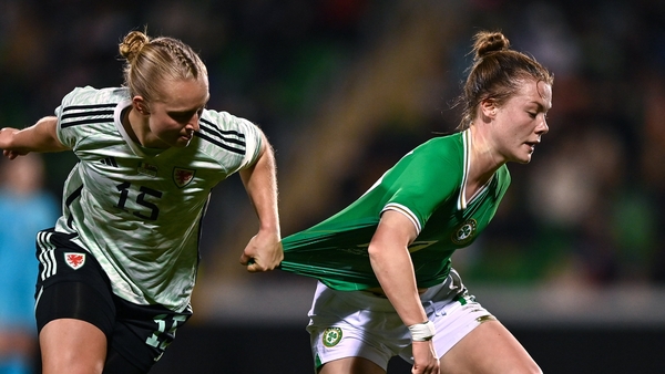 Emily Murphy (R) in action against Elise Hughes of Wales