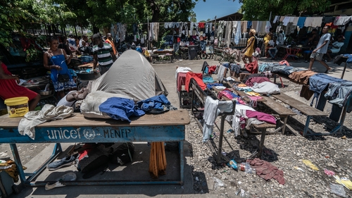 The forecourt of a former school turned into a camp for people displaced by rising gang violence in Port-au-Prince, Haiti