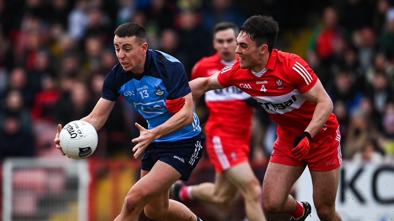 Dublin's Cormac Costello (L) in action against Derry's Conor McCluskey in last year's Division 2 clash