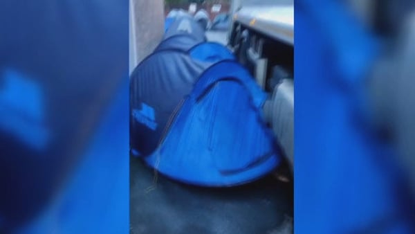 At least two tents appeared to have been caught in the undercarriage of the truck