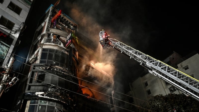 Firefighters work to extinguish the blaze
