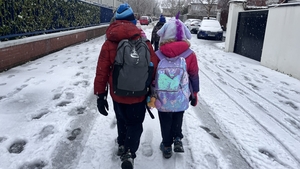 Snowy scenes in Clontarf during the morning school run