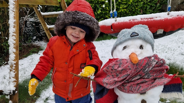 Sebastian Corbet makes snowman this morning in Leixlip (Photo from Karen Corbet))