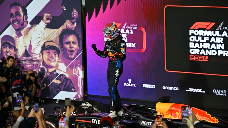 Max Verstappen celebrates after winning the opening race of the F1 season