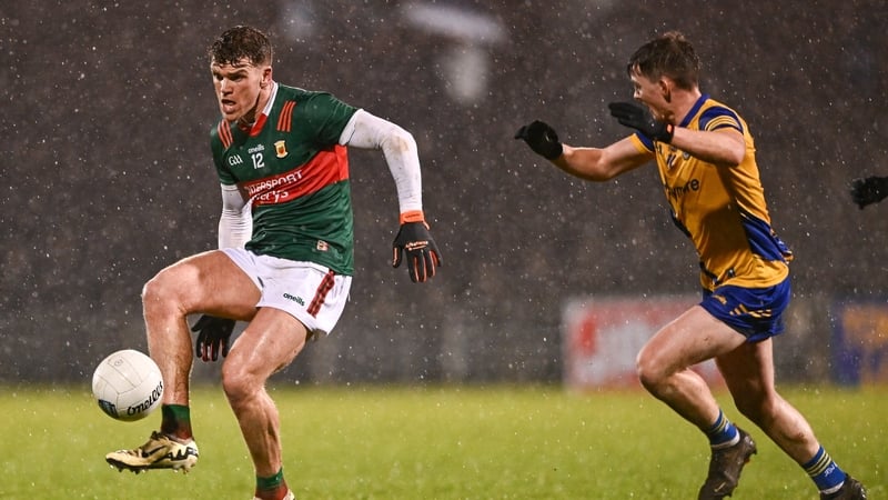 Jordan Flynn shadowed by Robbie Dolan