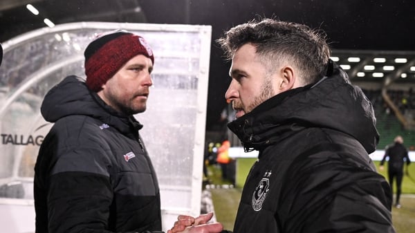 Ruaidhrí Higgins (L) and Stephen Bradley at the end of what was an entertaining encounter