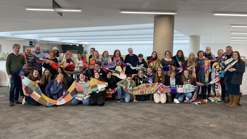A scarf claiming to be the longest in Wales represents children in the Welsh care system