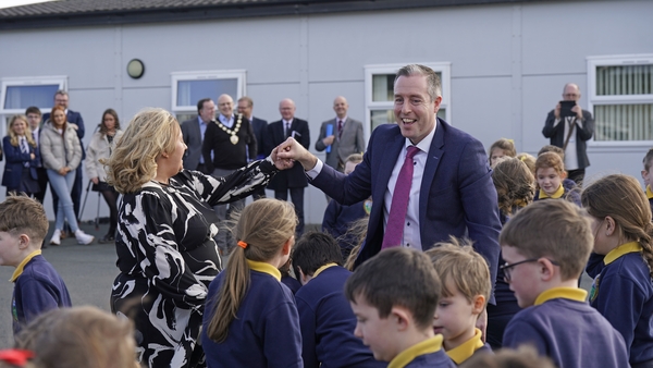 Paul Givan made his first-ever visit to an Irish-medium school where he partook in céilí dancing with the pupils of Gaelscoil Aodha Rua in Dungannon, Co Tyrone