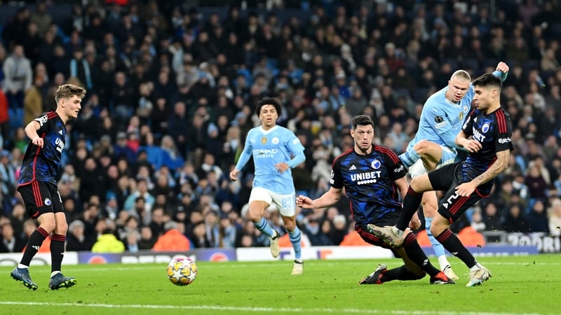 Erling Haaland shoots to score Manchester City's third goal against Copenhagen