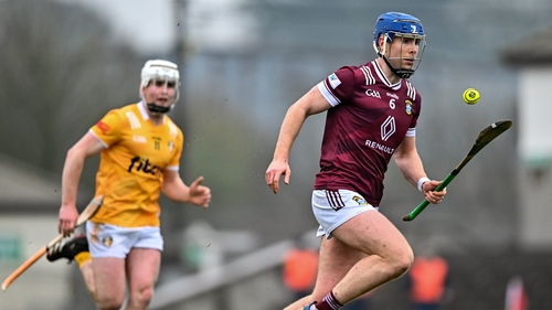 Kevin Regan of Westmeath gets away from Rian McMullan