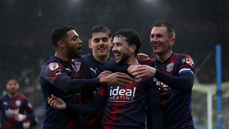 Mikey Johnston (second from right) celebrates with his West Brom teammates