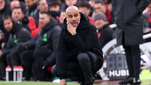 Pep Guardiola looks on during another enthralling battle with Liverpool