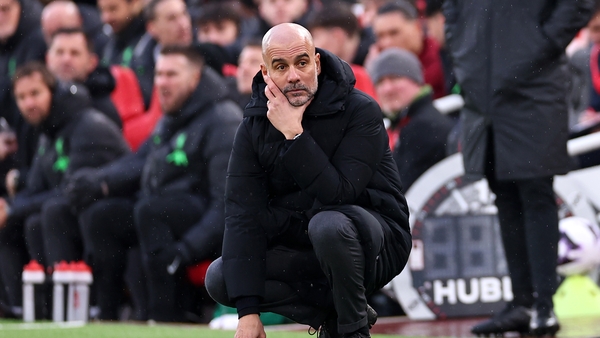 Pep Guardiola looks on during another enthralling battle with Liverpool