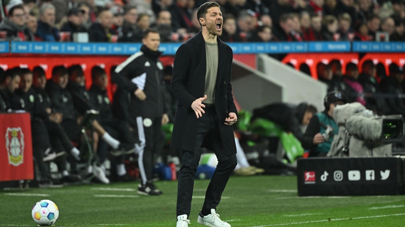 Xabi Alonso urging his Bayer Leverkusen side on during the win over Wolfsburg