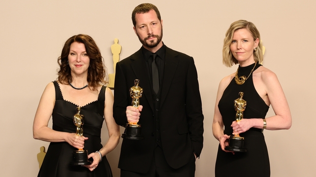 Raney Aronson-Rath, Mstyslav Chernov, and Michelle Mizner, winners of the Best Documentary Feature Film for 20 Days in Mariupol