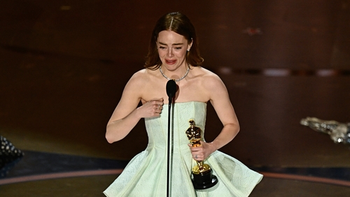 An emotional Emma Stone accepting her Best Actress Oscar on Sunday night
