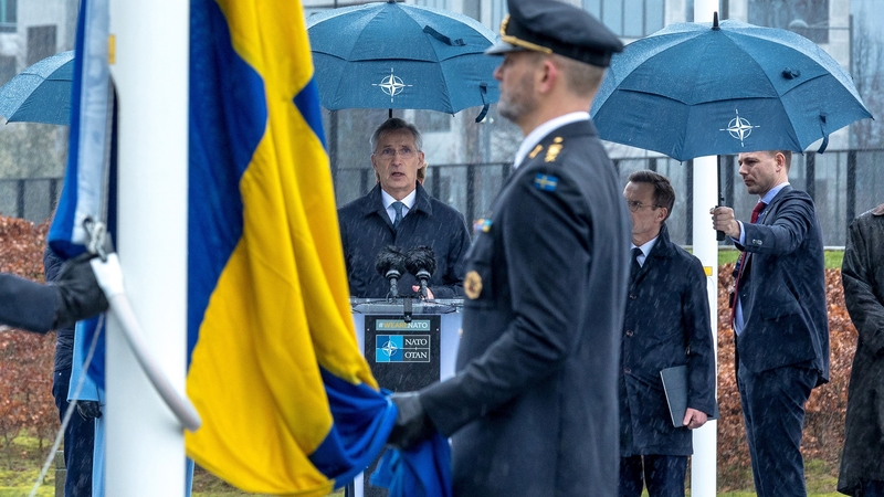NATO Secretary General Jens Stoltenberg gives a speech during the flag-raising ceremony for Sweden's accession to NATO in Brussels, Belgium