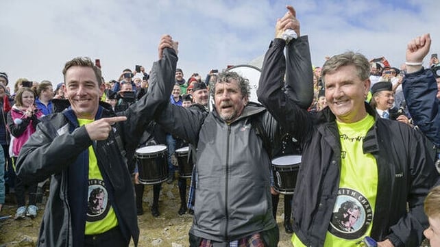 Broadcaster Ryan Tubridy and singer Daniel O'Donnell pictured with Charlie Bird while climbing Croagh Patrick (Pic: RollingNews.ie)