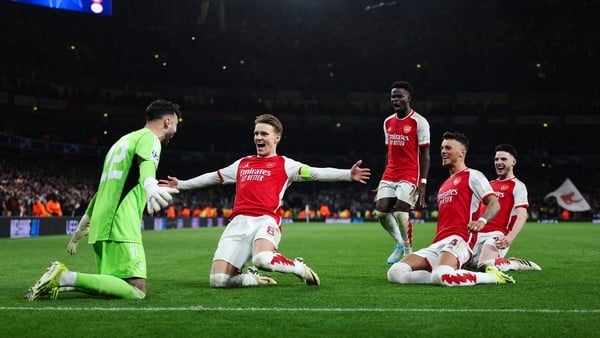 Goalkeeper David Raya and his Arsenal team-mates celebrate their penalty shootout win over Porto