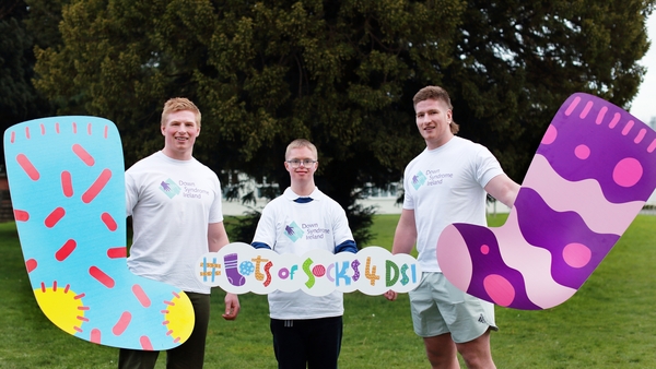 Ireland rugby star Joe McCarthy (R), with his brothers Paddy (L) and Andrew (C) at the launch of Down Syndrome Ireland's Lots of Socks campaign for World Down Syndrome Day.