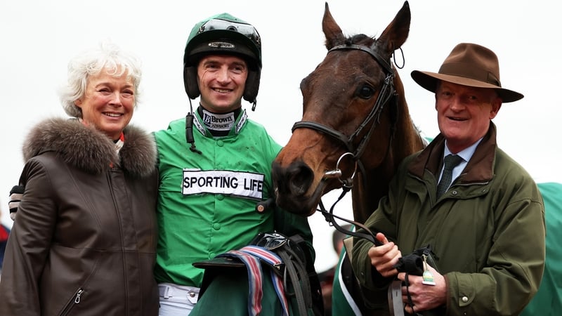 Jackie Mullins, Patrick Mullins, Jasmin De Vaux and Willie Mullins pose for the cameras after a milestone winner