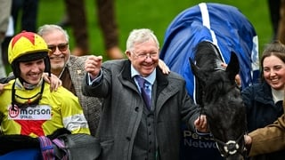 Co-owner Alex Ferguson celebrates the victory of Monmiral in the Pertemps