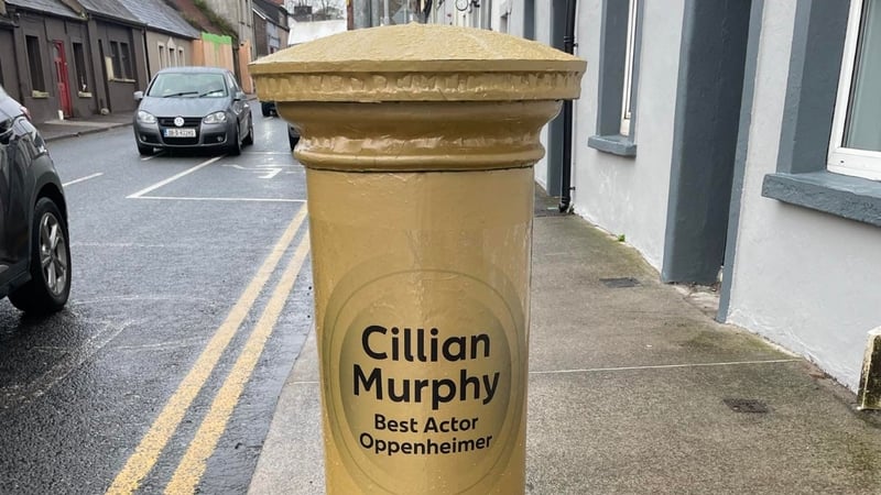 Locals are already stopping to take selfies next to the post box which reads 'Cillian Murphy Best Actor Oppenheimer'