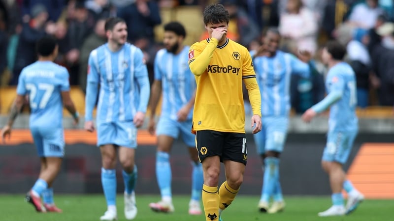 Wolves' Hugo Bueno looks dejected after conceding a third goal to Coventry City