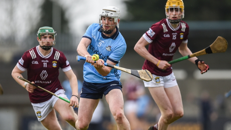 Dublin's Conor Donohue gets the pass away under pressure at Parnell Park