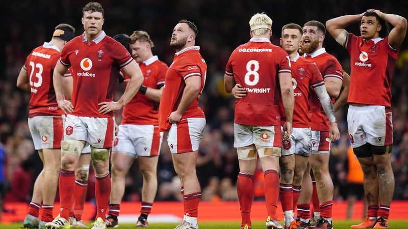 Wales are dejected after the final whistle goes