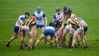 Kilkenny and Waterford players battle for the sliotar