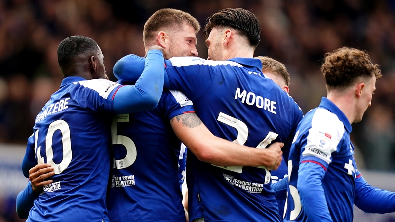 Ipswich Town's Cameron Burgess (C) is congratulated on scoring their second goal
