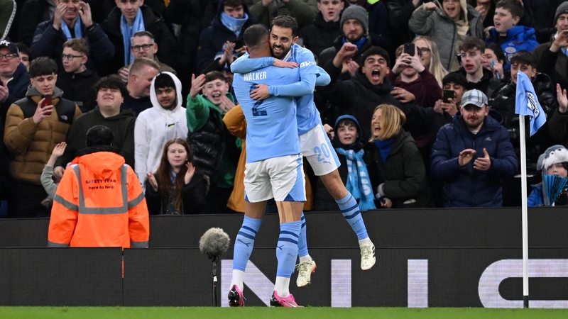 Bernardo Silva celebrates his opener with Kyle Walker