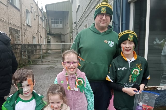 The O'Mahony family from Ballyduff Upper, Co Waterford enjoying the St Patrick's Day parade in Fermoy, Co Cork