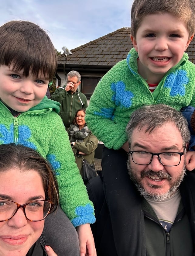 Arlo (L) and Reuben Brogan get a bird's eye view of the Clane parade thanks to mum Laura and Dad Andrew
