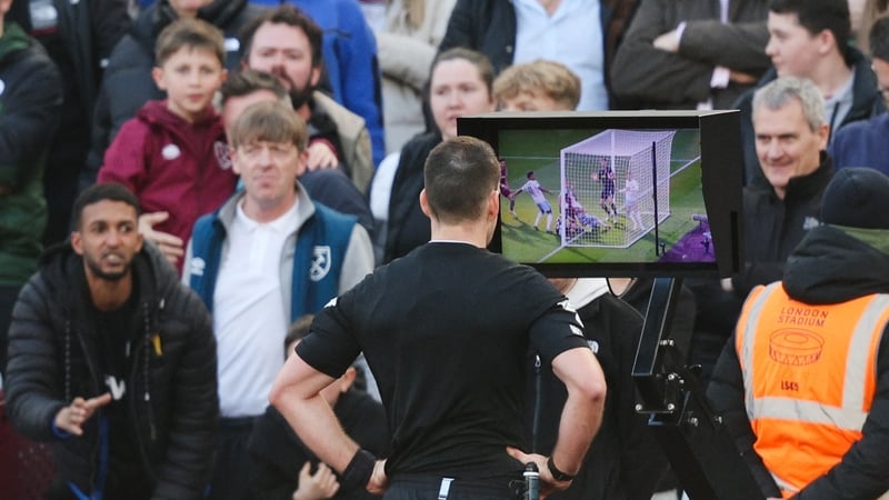 Referee Jarred Gillett checks Michail Antonio's subsequently disallowed goal