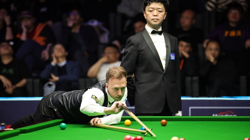 Judd Trump won three frames on the spin to secure his last-four spot