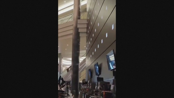 Watch: Eyewitness takes cover amid gunfire in Moscow hall