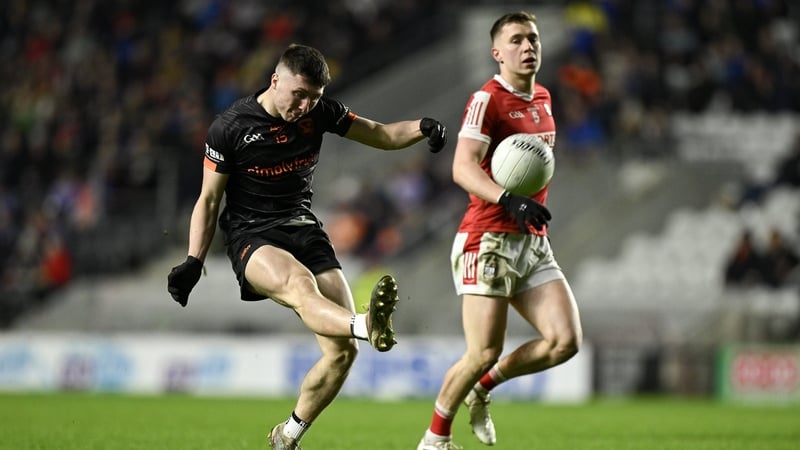Oisín Conaty (L) kicked a crucial late score for Armagh