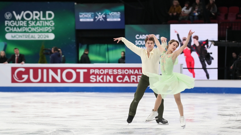 Shane Firus (L) and Carolane Soucisse on the ice in Montreal