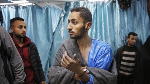 Palestinians who were detained during Israeli army attacks on Al Shifa hospital are brought for treatment after being released