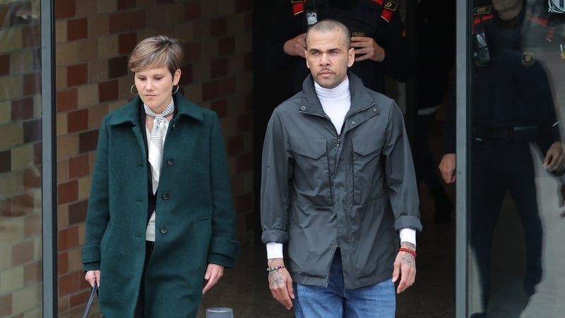 Daniel Alves and his lawyer, Ines Guardiola, leaving the Brians 2 prison outside of Barcelona