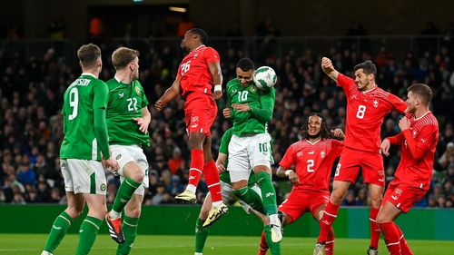 Adam Idah with a headed effort on goal against Switzerland