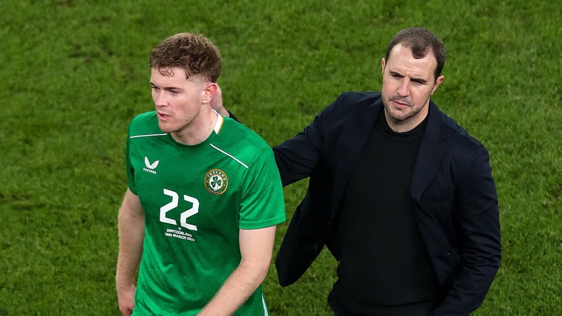 Ireland interim head coach John O'Shea and Nathan Collins after the friendly defeat to Switzerland
