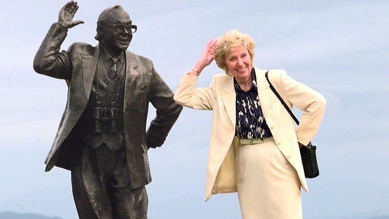Joan Morecambe alongside a statue of her husband Eric