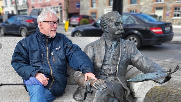 Vincent Woods at the statue of Percy French