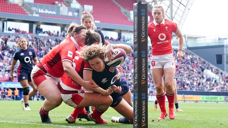 England's Ellie Kildunne scores scores her side's fifth try against Wales