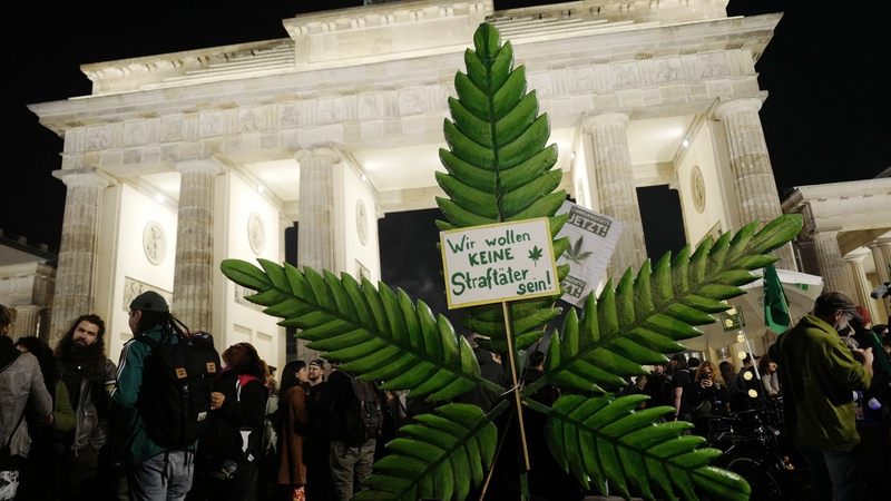Hundreds of people cheered by Berlin's iconic Brandenbrug Gate as the law took effect