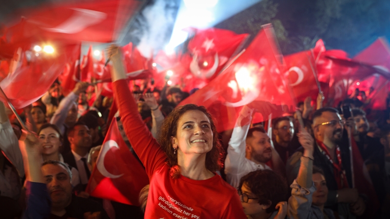 Supporters celebrate as Ekrem İmamoğlu speaks after his re-election in Istanbul, Turkey