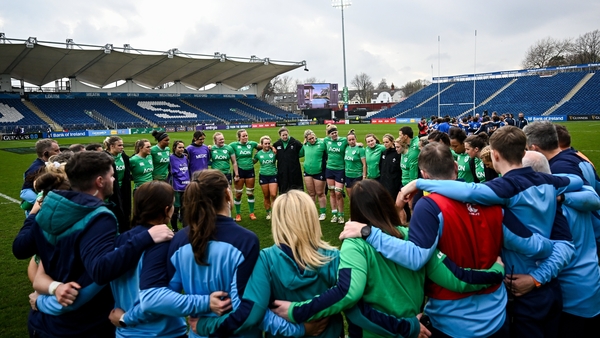 Ireland players huddle after the match